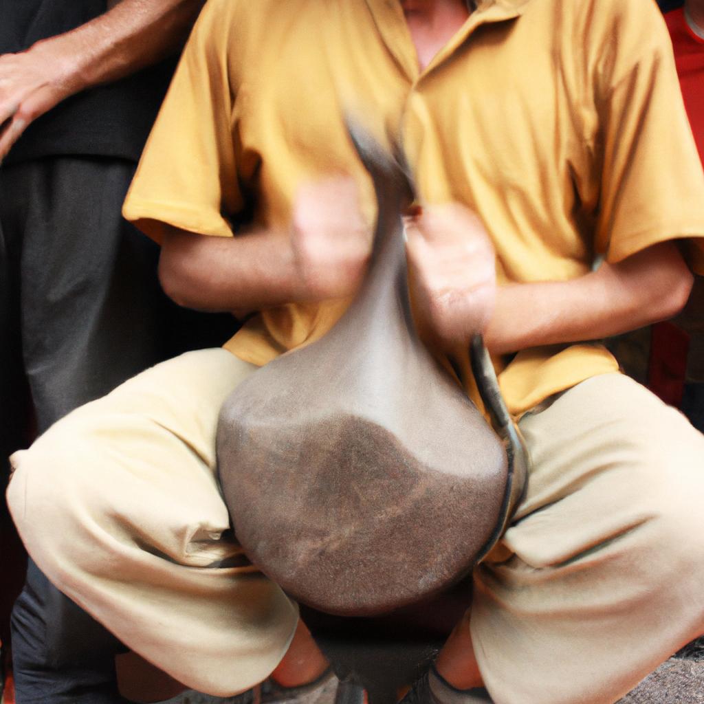 Person playing traditional musical instrument